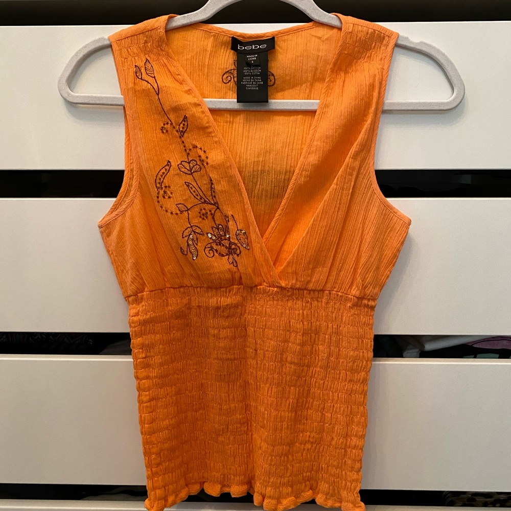 Bebe top with sequence detail